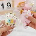 Cute TPR cat-shaped squeeze toys for stress relief, available in pink and white variants - Creamy Egg Cat