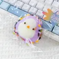 Purple chick TPR squishy stress relief toy with Pingu Family star tag in packaging - Little Sparrow (Purple)