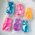 Macro detail of colorful gummy bear squishy stress toys in clear plastic wrappers - Gummy Bear Maltose / OPP Bag / Blue