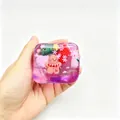 Christmas themed gingerbread man squishy stress relief toy in purple - Box Packaging / Christmas Purple