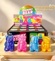 Detail showing colorful marble-patterned gummy bear squishy toys with retail display box - Swirl Texture Bear (Dark Blue)