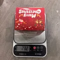 Festive red Christmas Santa Claus stress relief squeeze toy weighing 232g on a digital scale - Maltose Santa Claus / 1 Piece