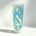 Jouet à presser en tube de dentifrice bleu transparent avec gel et morceaux de fruits - Style Emballage PVC Pêche (Remplissage Vaseline)