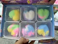 Set of 6 colorful heart-shaped squishy stress relief toys in transparent boxes - Heart Crisp