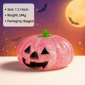 Detailed view of pink glitter Halloween pumpkin squeeze toy with size and weight specs - Pumpkin Pattern / Pink