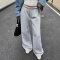 Loose fit grey wide-leg sweatpants with drawstring waist for casual streetwear style - S / Bottoms / Light Gray