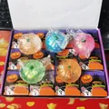 Halloween Kürbis Stressabbau-Spielzeug Set mit Glitzerfüllung in verschiedenen Farben - 12er Pack (4 Farben) / 12er Set