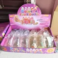 Bunte Squeeze Fruit Bottle Maltose Stressabbau-Spielzeugset in einer lila Displaybox - Endbox 12er Set