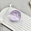 Handheld purple jelly stress relief kneading toy ball in star-shaped plastic pouch - Purple