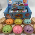 Dettaglio di panini squishy in gelatina glitterata in mini cesti per vapore - Panino di Gelatina (8.5cm) / Oro