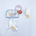 Cute cartoon knife squishy toy with orange bell accessory for creative stress relief - Kitchen Knife