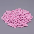 Pile de petits blocs ronds en plastique rose pour le remplissage de jouets squishy faits main - Pack de 50g / Rose Clair