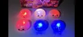 Set of colorful glowing LED bun squeeze toys with cute expressions and glitter - LED Halloween Glitter Burst Giant Bun / 8.5cm