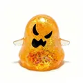 Primer plano detallado de un juguete para apretar de fantasma de Halloween naranja brillante. - Fantasma del Diablo / Amarillo
