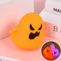 Cute orange Halloween ghost squishy stress relief toy with glowing LED light effect - Yellow Ghost (Scary Glowing Style)