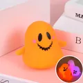 Cute orange ghost squishy stress relief toy for Halloween with glowing light-up feature - Yellow Ghost (Ghost Face Glowing Style)