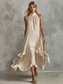 Detail view of the elegant white halter neck dress with a tiered ruffled hemline - S / Dresses / Khaki