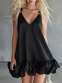 Close-up detail of a chic black V-neck mini dress with elegant ruffle hem - XS / Dresses / Black