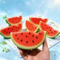 Detailed view of simulated watermelon slice slow-rising squishy stress relief toy - Large Bitten Watermelon / 16x7x6cm
