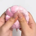 Handmade pink peach squeeze toy with crispy wax skin for stress relief therapy - Peach Wax Skin Ball / Pink