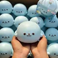 Soft blue seal squishy toy with snowflake patterns held in hands for stress relief - Color Box / Blue
