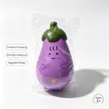 Macro detail of purple cartoon eggplant squishy toy with cute face in clear packaging bag - 12.5cm Eggplant in OPP Bag