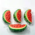 Detail view of individually wrapped realistic watermelon slice squishy stress relief toys - Watermelon Red (Bagged)
