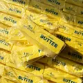 Detailed close-up showing realistic texture of butter stick shaped squeeze squishy toy - Butter Stick Shape / 13.5cm Size / Light Yellow