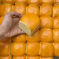 Realistic square orange bread squishy toy for stress relief and sensory play detail view - Hawaiian Bread (Full Spray) / 6x6 Item / Mustard Yellow