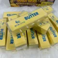 Macro view of realistic yellow butter stick slow rebound stress buster squishy toy - Butter Stick Yellow
