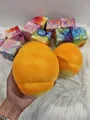 Detail macro view of simulation cheese slow rebound squishy toy for stress relief - Extra Large Hog Bun Style / Orange Yellow