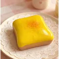 Slow rebound squishy toy shaped like realistic butter toast bread for stress relief. - Yellow Square Toast
