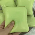 Light green butter toast squishy toy for stress relief with slow rebound feature - Green Toast Style