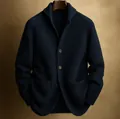 Detail view of a premium navy blue shawl collar knitted cardigan with three buttons. - Navy Blue