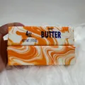 Orange marbled butter stick squishy toy made of slow-rising PU foam for stress relief - Marble Butter Stick / Orange Marble (14cm)