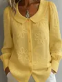 Detail eines gelben Langarmhemdes mit floralem Jacquard und Puppenkragen - 3XL / Oberteile / Gelb