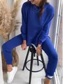 Royal blue patchwork fake two-piece sweatshirt and jogger set shown on a model. - S / Top And Bottom / Blue