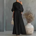 Elegante completo nero due pezzi con top monospalla e pantaloni fluidi a gamba larga - Taglia S / Top E Pantaloni / Nero