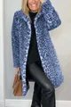 Detailed view of a model showcasing the blue leopard print faux fur coat texture and fit - 3XL / Tops / Mid-Length / Blue
