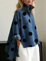 Profile view of blue faux denim shirt with large black polka dots and stand collar - S / Tops / Blue
