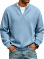 Detailed view of sky blue waffle knit texture and fake two-piece collar design - Blue