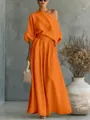 Elegante completo a due pezzi arancione con top monospalla e pantaloni larghi. - Arancione