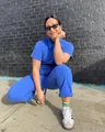 Street style blue short-sleeved zip-up jumpsuit for women in trendy outdoor setting - XS / Set / Blue