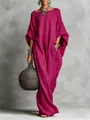 Elegantes fuchsiafarbenes Maxikleid mit langen Ärmeln und Taschen in der Detailansicht - Rot