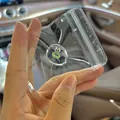 Macro view of a mini green squeeze toy inside a transparent zip-lock bag packaging - Random Expression Small Booger / PVC Bag