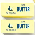 Detailed close-up of realistic salted butter stick slow rebound squishy toy for stress relief - Butter Stick / 24cm