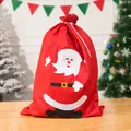 Large red felt Santa Claus gift sack shown in a cozy festive Christmas room setting - Medium Smiling Santa Applique Style