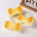 Juguetes antiestrés con forma de hueso de perro, pan de simulación de rebote lento - Hueso de Perro