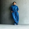 Full-body view of women's blue loose turtleneck sweatshirt and wide-leg pants lounge set - S / Top And Bottom / Blue