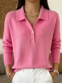 Detailweergave van een roze gebreide polotrui met knoopsluiting en geribbelde textuur - S / Tops / Roze